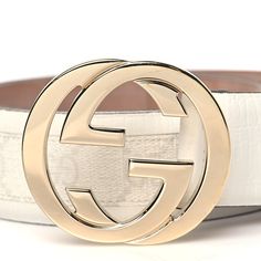 This is an authentic GUCCI GG Plus Monogram Calfskin Interlocking G 40mm Belt 85 34 in White. This belt has a classic but very contemporary look. It is is a wide belt crafted of white Gucci GG logo canvas, framed by textured white leather. The belt has a prominent light gold Gucci GG logo buckle. Gg Logo, Wide Belt, White Leather, Calf Skin, Dust Bag, Buckle, Monogram, Gucci, Canvas