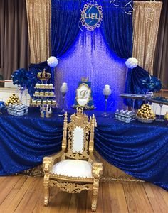 a blue and gold themed party with fancy decorations