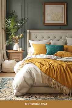 a bed with yellow and green pillows in a bedroom next to a plant on the floor