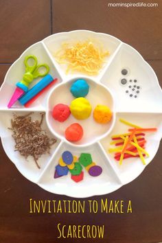 a white plate topped with lots of different types of crafting supplies on top of a wooden table