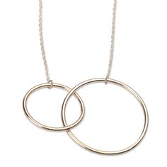 Two polished rings intersect in a modern design inspired by eclipses and their mystic symbolism. Often associated with evolution and change, this astronomical phenomenon is represented by the sterling silver pendants that dangle gracefully from an elegant necklace crafted by Shant Keshishian in his studio based in the stunning city of Yerevan. Necklace Craft, Elegant Necklace, Sterling Silver Necklace Pendants, Elegant Necklaces, Silver Pendants, Silver Pendant Necklace, Sterling Silver Pendant, Sterling Silver Pendants, Silver Pendant