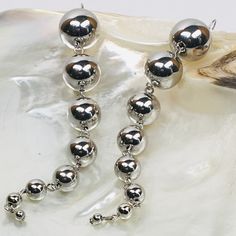 Silver Ball Beads Fashion Dangle Earrings About 6” Drop, Hook Backings Elegant Polished Beads Dangle Earrings, Elegant Dangle Beaded Earrings With Polished Beads, Elegant Polished Beaded Dangle Earrings, Elegant Polished Beads Earrings For Party, Elegant Party Earrings With Polished Beads, Silver Earrings With Polished Beads, Silver Linear Earrings With Dangling Beads For Party, Cheap Silver Ball Chain Jewelry, Silver Ball Hoop Earrings