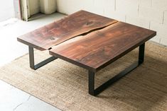 a wooden table sitting on top of a rug