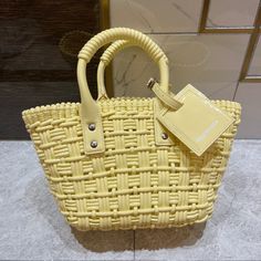 Size: 17cm*26cm*15cm OR 32cm*13cm*40cm It comes with Dust box, Care manual, Tag, and Paper bag. Luxury Yellow Rectangular Bucket Bag, Yellow Square Box Bag For Shopping, Square Yellow Box Bag For Shopping, Yellow Rectangular Box Bag For Shopping, Rectangular Yellow Box Bag For Shopping, Yellow Top Handle Box Bag With Large Capacity, Yellow Rectangular Box Bag, Luxury Yellow Bags With Braided Handles, Luxury Yellow Bag With Braided Handles