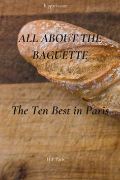 two loaves of bread sitting on top of a wooden cutting board with the words all about the baguette