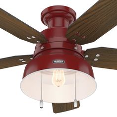 a red ceiling fan with wooden blades and a light bulb on the top of it