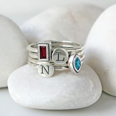 "We just love these stacking birthstone rings in sterling silver. Can be worn by itself or stacked with other rings. Stack your birthstone, or get one birthstone for each child or grandchild! **This listing is for one sterling silver and Swarovski crystal birthstone ring in either cross, heart, marquise, round, square, or rectangle stone setting. These rings stack great with our stackable initial rings!: https://www.etsy.com/listing/214822179 ♥♥ HOW TO ORDER ♥♥ 1. CHOOSE YOUR RING SIZE FROM THE Ring For Mom, Initial Rings, Sterling Silver Stackable Rings, Birthstone Stacking Rings, Mothers Ring, Design Your Own Ring, Sophisticated Jewelry, Multiple Rings, Stackable Rings Silver