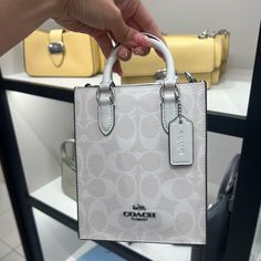 Nwt Coach Mini Tote In White With Strap High-end White Bag With Top Carry Handle, White Light Luxury Bag For Everyday Use, Light Luxury White Shoulder Bag For Everyday, White Light Luxury Shoulder Bag For Everyday, High-end White Handheld Shoulder Bag, High-end White Square Shoulder Bag, High-end White Double Handle Bag, High-end White Shoulder Bag For Shopping, High-end White Bags With Detachable Handle