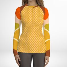 Women's UPF 50+ Rash Guard, Swim Shirt for Sun Protection in a cute 60s Mod Floral print. This swim shirt protects you from the sun, wind, and other elements while doing your favorite water sports. The slim fit, flat ergonomic seams, and longer body give extra comfort. Size tip: Petite and shorter torso lengths should consider sizing down. • 82% polyester, 18% spandex • 6.78 oz • Soft four-way stretch fabric • UPF 50+ • Comfortable longer body and sleeves • Flatseam and coverstitch Made to order Beachwear Tops With Uv Protection And Stretch, Stretch Beachwear Tops With Uv Protection, Fitted Uv Protection Beachwear Top, Fitted Beachwear Tops With Uv Protection, Fitted Surfing Tops With Upf 50+, Casual Tops With Uv Protection For Poolside, Casual Uv Protection Tops For Poolside, Casual Poolside Tops With Uv Protection, Fitted Crew Neck Tops For Beach Season