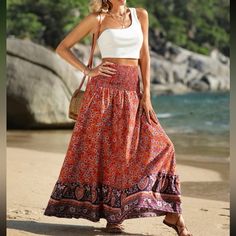 Red Fitted Maxi Skirt For Beach, Red Maxi Skirt With Elastic Waistband For Beach, Red Tiered Maxi Skirt For Beach, Red Tiered Maxi Skirt For The Beach, Red Bohemian Bottoms For Beach Season, Bohemian Red Bottoms For Beach Season, Orange Beach Skirt With Elastic Waistband, Casual Red Maxi Skirt For Vacation, Red Non-stretch Bohemian Skirt