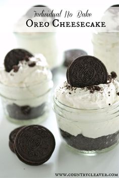 oreo cookies and whipped cream in small mason jars on a white table with chocolate chips