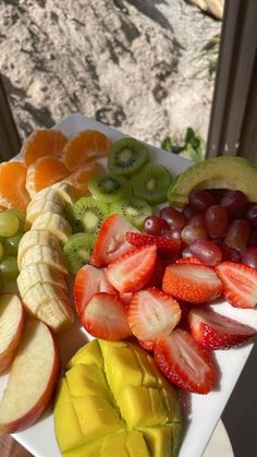 there are many different types of fruit on the plate