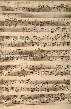 an old sheet with music notes on it