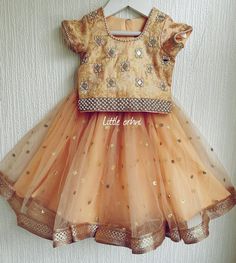 "✨ Step into elegance with our enchanting pastel peach  lehenga with hand embroidery - a delicate and intricate piece that will make you the center of attention on any special occasion!\" ✨ The pastel peach  lehenga with hand embroidery is a stunning and sophisticated traditional Indian outfit that is perfect for special occasions such as weddings, festivals, or parties. This set consists of a lehenga skirt, a blouse, and a chunni, all adorned with intricate hand embroidery. The lehenga skirt of this set is made from soft and lightweight fabrics such as net  and brocade  and features beautiful hand embroidery throughout the fabric. The blouse is also embellished with matching embroidery and is designed with a round neck and short sleeves. ✨ This pastel peach  lehenga set is available in a Peach Anarkali Dress For Festive Occasions, Festive Fitted Peach Anarkali Set, Traditional Peach Dress For Diwali, Fitted Peach Lehenga For Festivals, Festival Peach Lehenga, Festive Peach Fitted Dress, Pink Lehenga For Festive Occasions, Peach Anarkali Set With Dori Work, Peach Choli For Navratri Festival