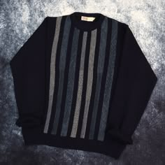 "Details: Vintage navy and blue striped crew neck grandad jumper by EWM. Made in the UK. Condition: Great Signs of wear: N/A Size: Small Measurements: Length - 26\" Pit to Pit - 21\" Shoulder to cuff - 24\"" Classic Striped Sweater With Ribbed Collar, Navy Casual Sweater With Contrast Stripes, Casual Blue Sweater With Contrast Stripes, Casual Winter Sweater With Vertical Stripes, Classic Striped Crew Neck Sweater, Blue Crew Neck Sweater With Horizontal Stripes, Striped Crew Neck Sweater With Ribbed Collar, Striped Sweater With Ribbed Collar And Crew Neck, Striped Ribbed Crew Neck Sweater