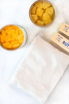 the ingredients to make mango butter are in small bowls and on top of a white surface