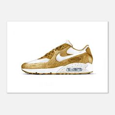 a gold and white nike air max sneaker on a white background with the word, nike