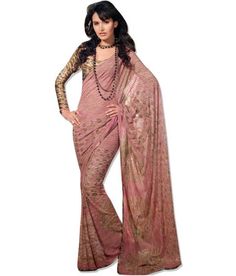 Beautifully crafted salmon and gold color #designer #saree is sure to bring all the admiration you deserve.  Match it up with accessories and jewelry to complete the look.  Get this lovely saree from #desiclik Gold Saree, 60 Plus, Indian Designer Sarees, Fashion Indian, Designer Sarees Online, Printed Saree, Saree Shopping, Dress Designer, Georgette Saree