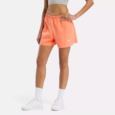 Casual and cozy-soft, these women's Reebok shorts are your go-to pair, any day and every day. Heavyweight cotton jersey is comfortable from the backyard barbecue to the music festival. Roll over the waistband for a stylish look and a pop of color. Coral Outfit, Bottom Workout, Fitness Trends, Backyard Barbecue, Reebok Women, Womens Jersey, Womens Reebok, Active Wear Shorts, Hem Style