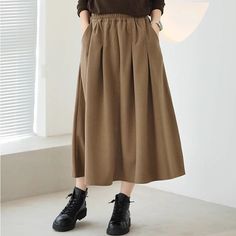 Details: Gender: Women Item Type: Skirt Material: Cotton Season: Spring, Autumn Pattern: Solid Style: Casual, Loose, Retro Waist Type: Elastic Waist Size: One Size Waist: 64.00 - 100.00 cm/ 25.20 - 39.37 " Length: 79.00 cm/ 31.10 " Fall A-line Maxi Skirt In Solid Color, Full Length Brown Relaxed Fit Skirt, Baggy Cotton Knee-length Skirt, Spring High-waist Baggy Maxi Skirt, Baggy High-waisted Cotton Skirt, Cotton Skirt, Casual Fall, Elastic Waist, Color