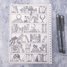 a book shelf filled with books and plants next to two markers on a marble surface