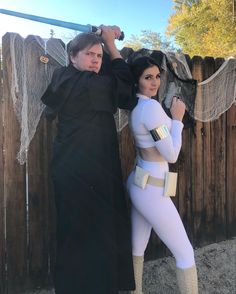 a man and woman dressed up as star wars characters