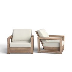 two wooden chairs sitting next to each other on top of a white flooring area