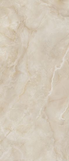 a white marble textured surface with some light brown streaks on it's edges