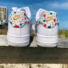 hand painted flower design on the heel of nike air force 1s Toddler Shoe Size Chart, Nike Kids Shoes, Toddler Nike Shoes, Custom Sneakers Diy, Customized Shoes, Painted Nikes, Shoe Painting, Shoes Air Force, Painting Shoes