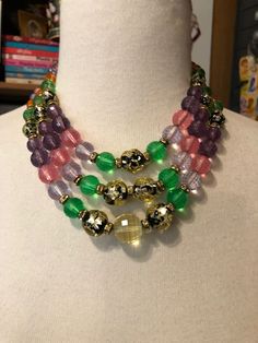 "What a fun vintage necklace this is! Dating back o the 1960s, this three-strand beauty is composed of faceted, graduated and multi-colored Lucite/plastic beads accented with foil glass beads as well as some rhinestone rondelles. Really makes a statement when worn and the choice of colors is amazing! Longest wearable length is 18\" and it is adjustable. Perfect for the summer!" Vintage Cosmetics, 60s Vintage, Pink Plastic, Glass Bead Necklace, Plastic Beads, Fashion Jewelry Necklaces, 1960s Vintage, Bead Necklace, Chain Styles