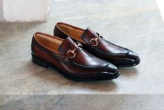 Style: 478-505-Whiskey Elegant Burnished Calfskin slip-on Loafer from the Carrucci collection features soft Calfskin lining, Patina Finish Horsebit Hardware detailing, and a clean welt! Elegant Brown Monk Strap Slip-on Shoes, Elegant Moc Toe Slip-ons For Office, Elegant Brown Moc Toe Moccasins, Elegant Brown Moccasins With Moc Toe, Elegant Wingtip Slip-ons For Business Casual, Elegant Brown Moc Toe Loafers, Elegant Brown Moc Toe Slip-ons, Elegant Brown Slip-on Tassel Loafers, Elegant Brown Wingtip Slip-ons