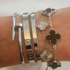 5 Piece Silver Clover Stack Set With Nail Love Slim Love Clover And Black Clover In Stainless Steel Non Tarnishing Hypoallergenic Can Be Worn Everyday Without Tarnishing Diamond Bracelets Stack, Gold And Silver Stacked Bracelets, Gold And Silver Jewelry Stack, Silver Jewelry Combo, Silver Jewelry Stack Bracelets, Chunky Silver Bracelets, Jewelry Layering Silver, White Silver Jewelry, Silver Stacked Bracelets