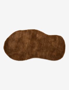 the sole of a brown shoe on a white background