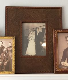 an old photo and two framed photos on a mantle