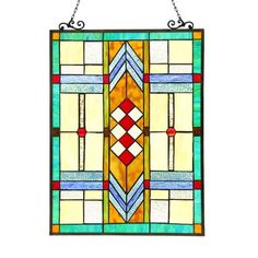 a stained glass window hanging on a chain