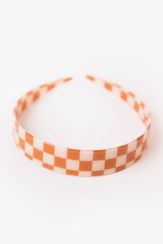 Need a new retro accessory? Look no further! The Dial Up Checkered Headband comes in three funky colors, perfect for any look. Wear them on a bad hair day or simply because you need some added style! Your summer looks just got a whole lot cuter! Trendy Multicolor Headband, Trendy Multicolor Summer Hair Accessories, Fun Adjustable Hair Accessories For Summer, Fun Summer Headband Hair Accessories, Fun Summer Hair Accessories Headband, Retro Adjustable Headband For Spring, Trendy Spring Band Headband, Trendy Multicolor Spring Headband, Playful Multicolor Headband For Summer