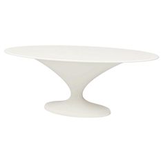 an oval white table on a white background