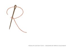 the letter r is made up of yarn and thread with an arrow on one end