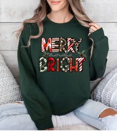 Get into the holiday spirit with our 'Merry and Bright' sweatshirt, a stylish and festive discovery from our Etsy Shop. This women's Christmas sweatshirt is crafted to bring a pop of color and joy to your holiday get-togethers, ideal for making cherished family moments or gifting to a loved one. ♥ PRODUCTION TIME: 1-5 days (Usually 2-3 days) ♥ SHIPPING TIME: 2-5 days (Usually 3 days) 🎁 LAST DAYS FOR CHRISTMAS DELIVERY 🎁 USA - 12/12/2023 ♥PRODUCT DESCRIPTION: Gildan Crewneck Unisex Sweatshirt S Christmas Long Sleeve Sweater With Letter Print, Christmas Sweater With Letter Print And Long Sleeves, Festive Christmas Crew Neck Sweatshirt, Festive Holiday Crew Neck Sweatshirt, Holiday Crew Neck Sweater With Letter Print, Christmas Letter Print Crew Neck Sweater, Holiday Letter Print Sweater, Christmas Crew Neck Sweater With Letter Print, Christmas Sweater With Letter Print