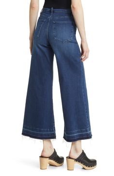 Made from superstretchy denim, these '70s-inspired palazzo jeans are remade for today with released hems and a slightly shorter inseam. 28 1/2" inseam; 28" leg opening; 12" front rise; 15" back rise (size 29) Zip fly with button closure Five-pocket style 77% cotton, 18% modal, 4% elasterell-p, 1% elastane Machine wash, dry flat Made in Turkey Casual Cotton Flares With Frayed Hem, Dark Wash Full Length Flares For Spring, Spring Dark Wash Full-length Flares, Stretch Flares With Frayed Hem For Spring, Spring Dark Wash Full Length Flares, Spring Dark Wash Flares With Five Pockets, Spring Dark Wash Cotton Flares, Fall Wide Leg Flares With Frayed Hem, Fall Wide-leg Flares With Frayed Hem