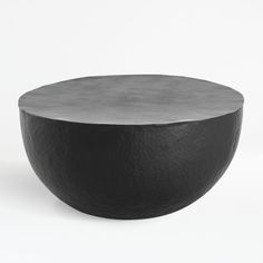 a black round table on a white background