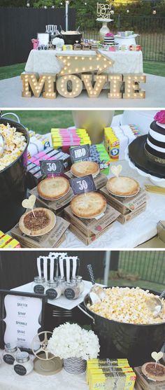 a movie themed birthday party with popcorn, cake and desserts on the buffet table