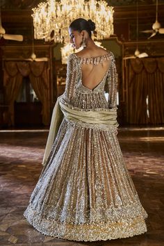 This set features a coffee brown jacket in tissue silk with delicate embroidery with bugle beads, sequin and crystal. The lehenga is in contrasting deep mustard lehenga has a broad border at the bottom. The slate tissue dupatta has a cut work border on all four sidesFrom Seema Gujral's Falaknuma collection. DELIVERY TIMEPlease allow 8-12 weeks for your outfit to arrive. FABRIC DETAILSLehenga & Jacket - Tissue Silk Dupatta - Tissue organza Professional cleaning only. Mustard Lehenga, Tissue Dupatta, Jacket Lehenga, Delicate Embroidery, Silk Dupatta, Bugle Beads, 12 Weeks, Coffee Brown, Brown Jacket