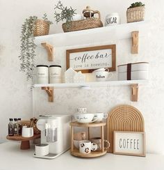 there are coffee cups and other items on the shelves