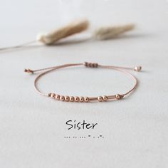 Sisters bracelet with the word "Sister" in Morse code. Individual gift for birthdays, Christmas, weddings. ⭐️ 3 variants to choose from - silver, rosé or mix (rosé & silver) ⭐️ Round beads represent a point, tube-shaped a line ⭐️ One size adjustable up to 25 cm with sliding knot ⭐️ Material: 925 silver and 925 silver rose gold plated ⭐️ Lovingly handcrafted Please feel free to contact us at any time if you have a question. Discover more Morse code bracelets: https://www.etsy.com/shop/madebyevia Morse Code Gifts, Big Sister Bracelet, Morse Code Bracelets, Code Bracelets, Code Morse, Budget Friendly Gift, Sister Bracelet, Morse Code Bracelet, Gift For Best Friend