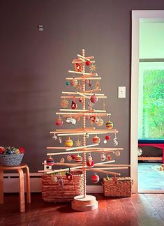 a christmas tree made out of wooden sticks