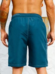 Stay organized and stylish with our Flap Pocket Swim Trunks. These swim trunks feature convenient flap pockets, providing storage for your essentials while on the beach or at the pool. The waistband offers a comfortable fit, and the quick-drying fabric ensures optimal comfort in and out of the water. Features: Color: Blue Pattern Type: Plain Details: Drawstring, Pocket Type: Bottoms Bottom Type: Shorts Fabric: Non-Stretch Care Instructions: Machine wash, do not dry clean Body: Lined Sheer: No Si Beachwear Swimwear With Built-in Shorts For Outdoor, Solid Swim Trunks With Elastic Waistband For Outdoor Activities, Outdoor Bottoms With Pockets For Beach Season, Beach Cargo Shorts For Summer, Summer Beach Bottoms With Cargo Pockets, Beachwear Bottoms With Pockets For Beach Season, Relaxed Beachwear Bottoms With Elastic Waistband, Summer Swim Trunks With Side Pockets For Outdoor, Summer Pool Shorts With Pockets