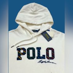 Elevate Your Casual Look With This Polo Ralph Lauren Pullover Hoodie In A Classic White Hue. The Drawstring Closure And Long Sleeves Provide Added Comfort, Making It Perfect For Walking In Fall Or Winter. The Breathable Fabric Blend Of Polyester And Cotton Ensures Durability And Easy Machine Wash. It Comes In A Size Large And Features A Personalized Logo Accent. This Hoodie Is Perfect For Men Who Prefer A Classic Fit And A Solid Pattern. Get This Wardrobe Staple For A Timeless And Versatile Addi White Hoodie With Embroidered Logo Long Sleeve, White Hoodie With Embroidered Logo, White Sporty Hoodie With Embroidered Logo, Sporty White Hoodie With Embroidered Logo, White Long Sleeve Hoodie With Embroidered Logo, White Hoodie Sweatshirt With Drawstring, White Winter Sweatshirt With Drawstring, Winter White Sweatshirt With Drawstring, White Drawstring Sweatshirt For Winter