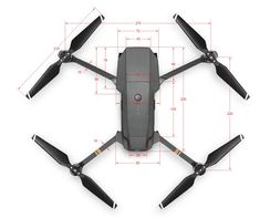 the top view of a black and gray quadcopte with measurements on it