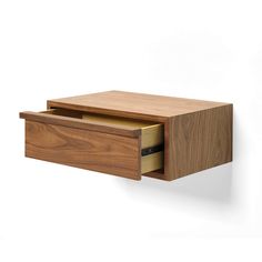 a wooden shelf with two drawers on it